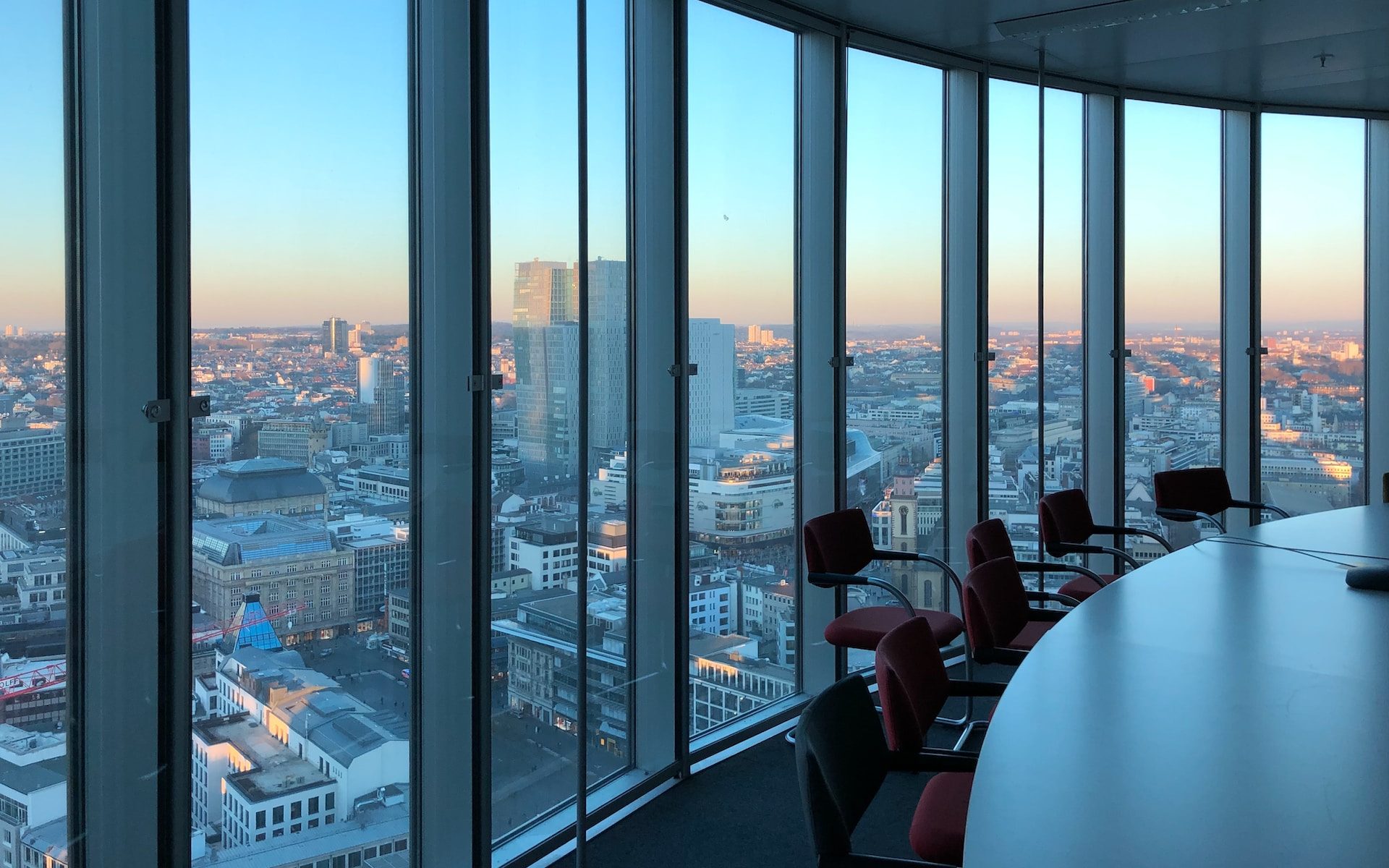 people sitting on chair near glass window during daytime